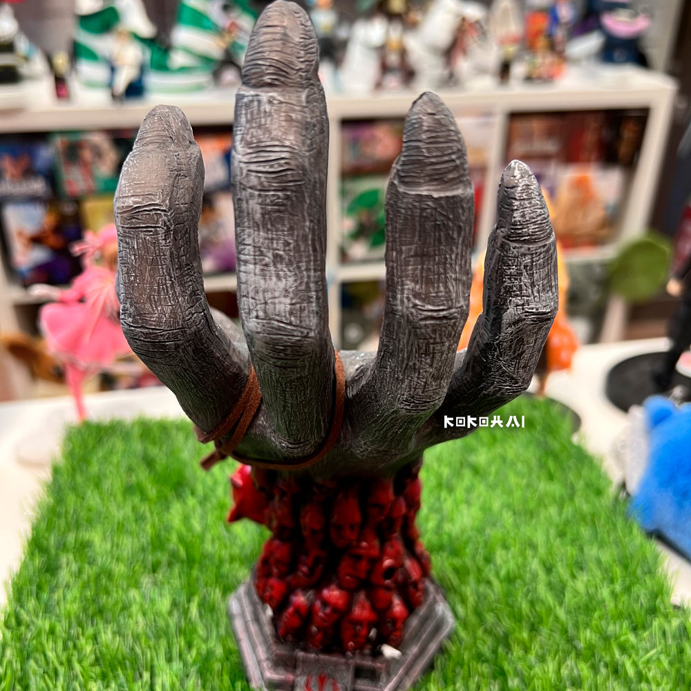 figura-mano-sello-maldito-guts
