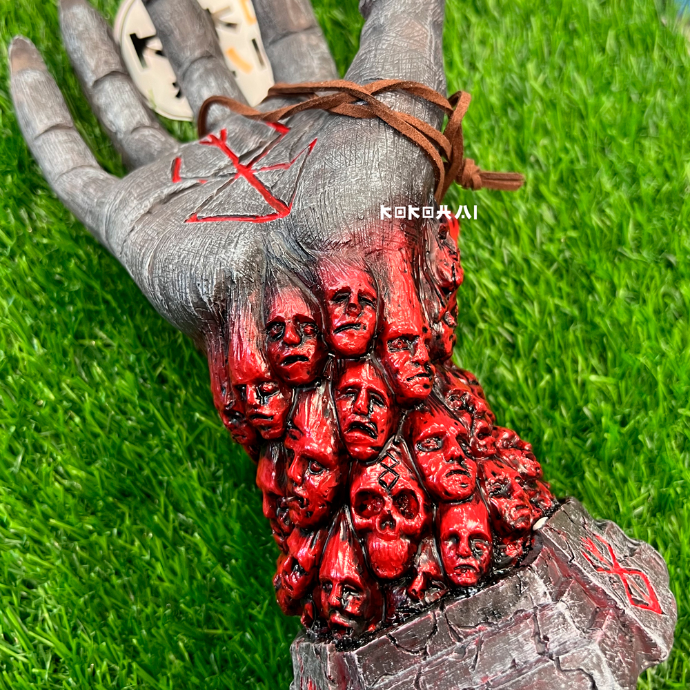 figura-mano-sello-maldito